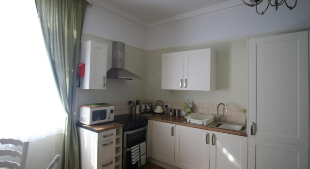 Апартаменты Spring Garden Guest House