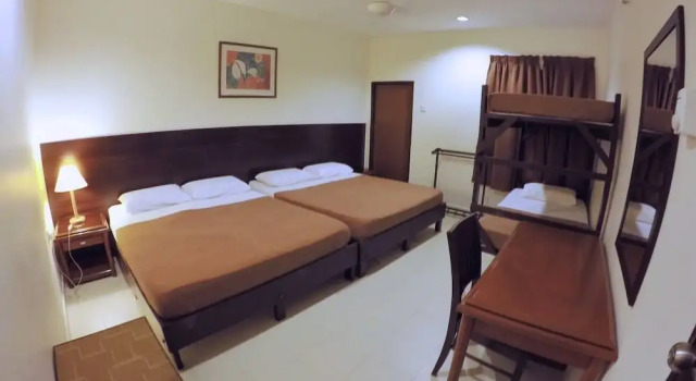 Кровать в общем номере Perhentian Tropicana Inn