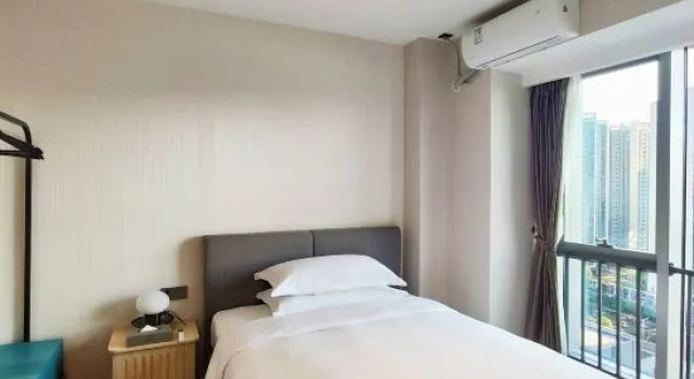 Двухместный люкс с 2 комнатами с видом на сад MORDIN Xinfei International Apartment