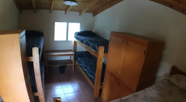 Кровать в общем номере Hostel del Glaciar Pioneros