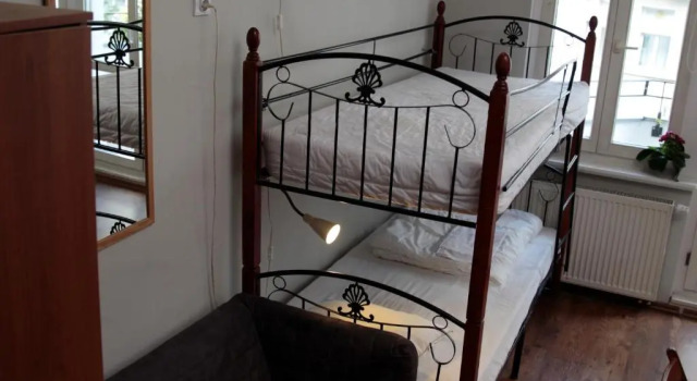 Кровать в общем номере Pit Stop Hostel