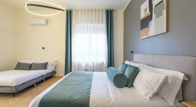 Deluxe Vierer Zimmer mit Balkon und mit Stadtblick Tolu Relais
