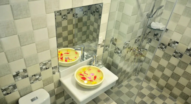 Трёхместный номер Deluxe c 1 комнатой с балконом Bis House Homestay