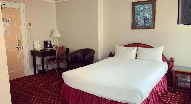 Четырёхместный номер Standard Bedford Regency Hotel, Trademark Collection by Wyndham