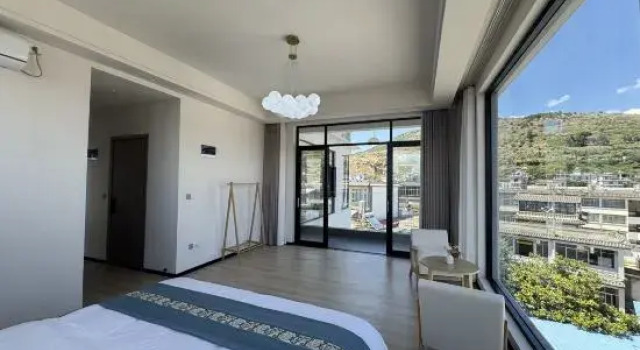 Люкс Deluxe Yunsujian Homestay Hotel (Dali Haidong Town)