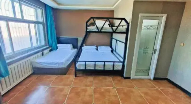 Кровать в общем номере Koala Electronics Competition Hotel