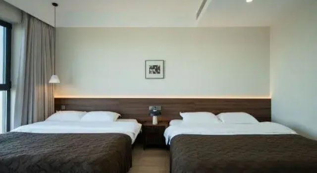 Четырёхместный люкс с красивым видом из окна Yuding Seaview Homestay (Liugong Island Wharf)