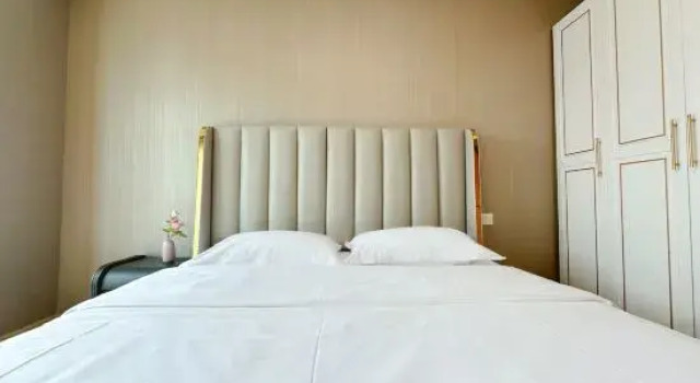 Люкс с 3 комнатами с видом на море Yuepeng Boutique Apartment (Dalian Harbour Plaza)