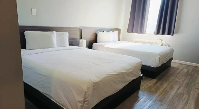 Standard Vierer Zimmer Champion Inn Motel By OYO Hwy 59 Shepherd