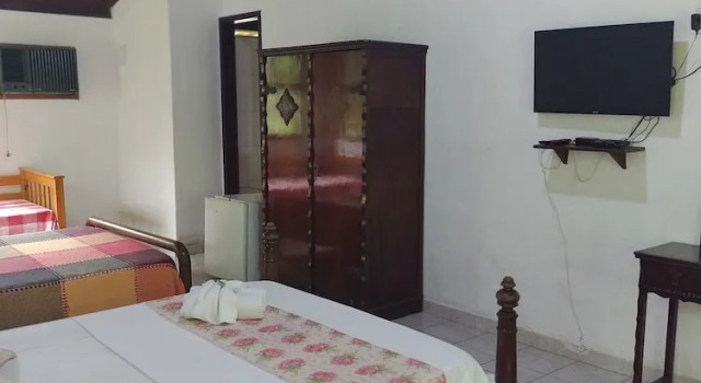 Кровать в общем номере Pousada Bela Vista