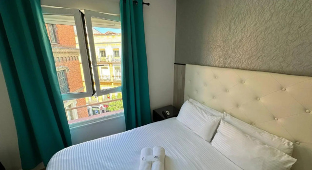 Apartamentos Day Madrid BALLESTA Centro Gran Via Sol Malasaña, Забронировать Апартаменты/квартира центр города Мадрид, рядом с Monumento a los Caídos por España