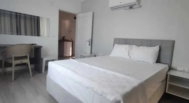 Четырёхместный люкс Comfort с балконом Aykaç Otel Susanoğlu