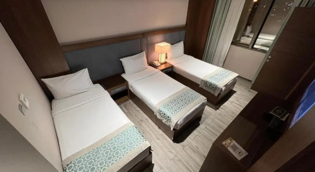 Трёхместный номер Violet Al Shisha Hotel