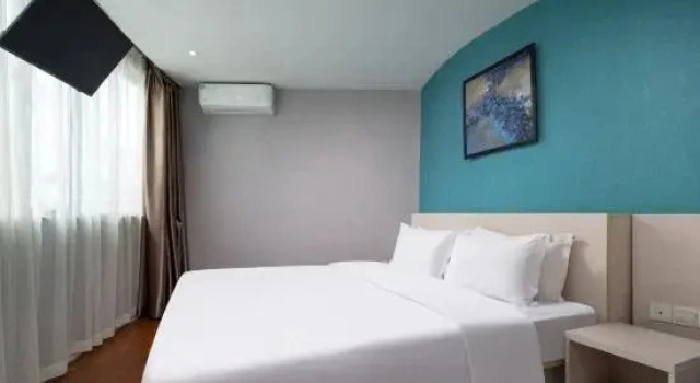 Семейный люкс Jintai Commerce Hotel
