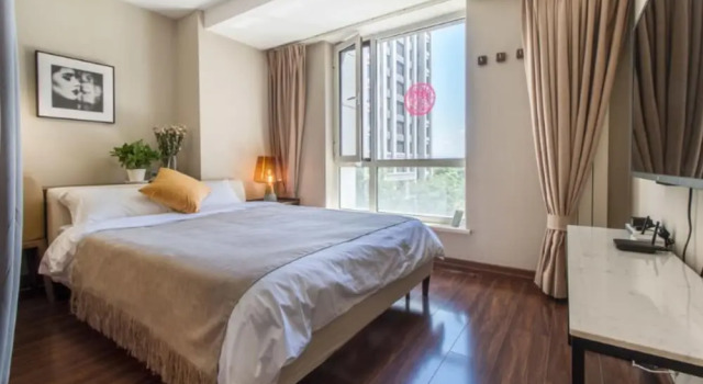 Home to Advanced Service Apartment New Country Exhibition Shop(Chinese Citizen Only), Book Lejlighed Hoteller i Beijing Province med parkering, Parkering