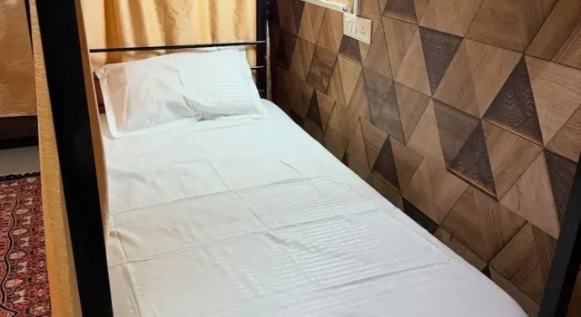 Кровать в общем номере Amritsar Backpackers Hostel