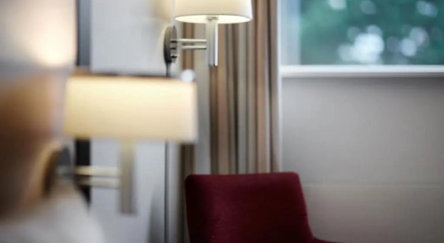 Кровать в общем номере с 6 комнатами Gentofte Hotel