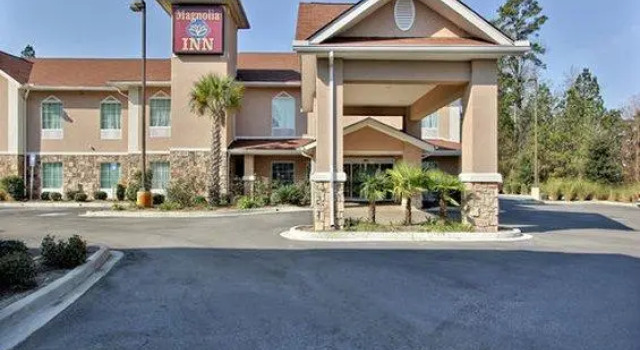 Кровать в общем номере Magnolia Inn and Suites Pooler