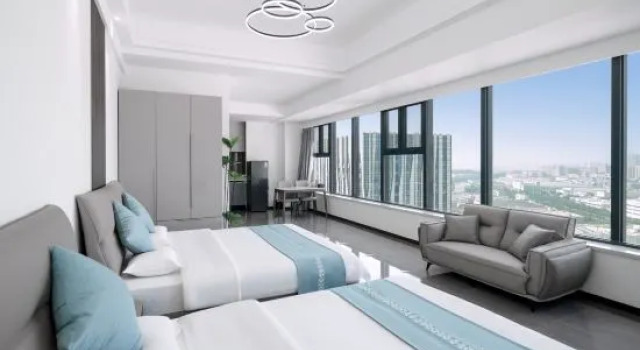 Семейный люкс Xingyu Hotel (Dalian Wanda Commercial Street Zhongtian Yunjing)