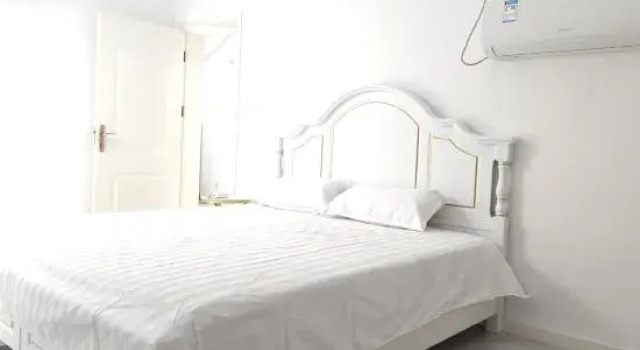 Люкс с 3 комнатами Qingdao Tianze Seaview Apartment