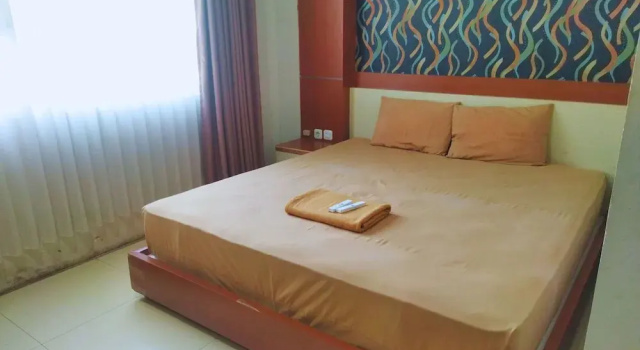 Camera Deluxe Hotel Karunia PKPRI