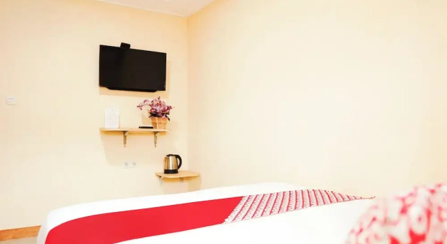 Номер Deluxe Collection O Jalan Jenderal Sudirman Near Pantai Padang Formerly Hotel Pratiwi Anggrek
