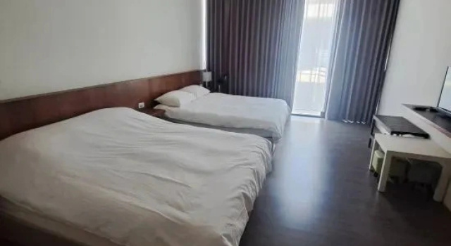Четырёхместный номер Standard с балконом и с красивым видом из окна Bai Ji Yi B&B