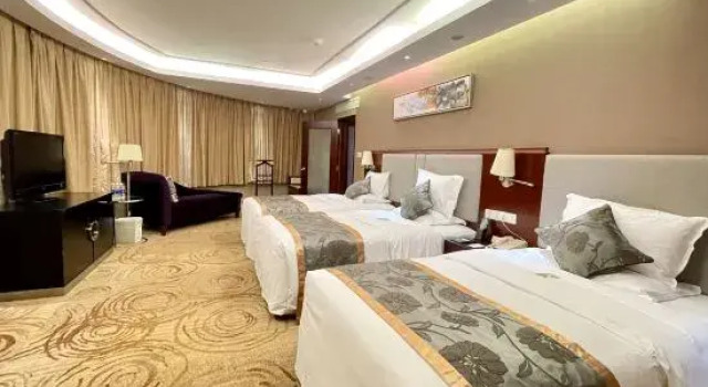 Трёхместный семейный люкс Guangxi Wharton International Hotel