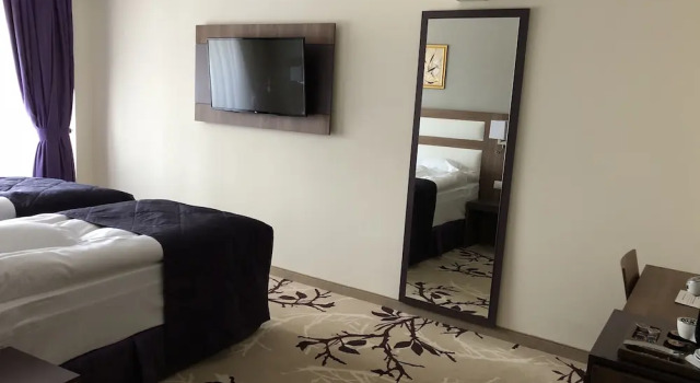 Deluxe Dvoulůžkový s manželskou postelí pokoj a částečným výhledem na moře Hotel New Belvedere