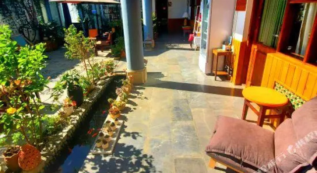 Dali Ancient Town Feng Huang Hua Kai Thai Hostel, Забронировать Хостел Старый город Дали Юньнань