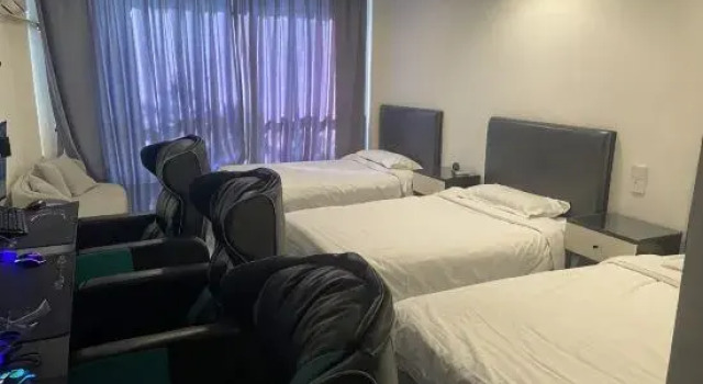 Кровать в общем номере 211 E-sports Hotel (Jinshan City Beach)