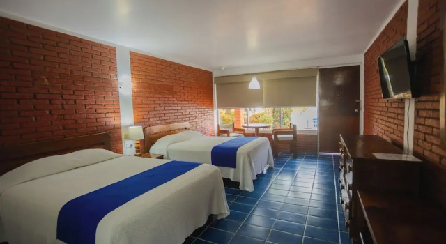 Четырёхместный номер Standard с видом на внутренний двор Hotel Plaza Palmas