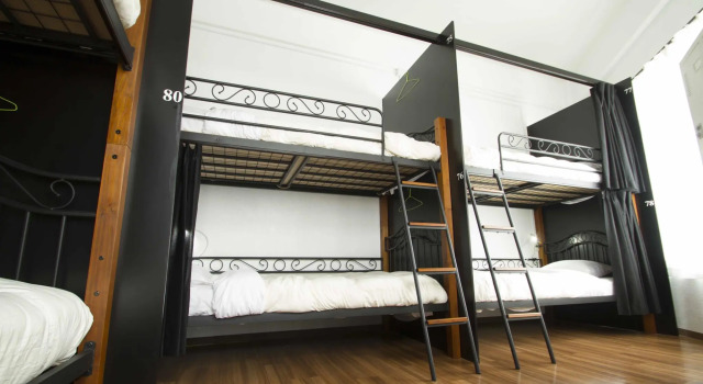 Кровать в общем номере Guest House Umikaji