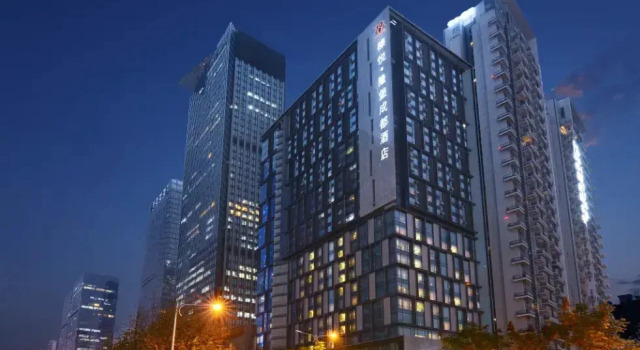 Отель Zhenyue Longbao Chengdu Taikoo Li Branch Chunxi Road, Забронировать Отель Бизнес-отели Чэнду, рядом с Район Сино-Оушн Тайкоо Ли, 4* 5*