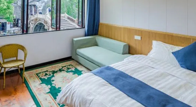 Люкс с 2 комнатами Nanzha Fuchang Bridge Family Vacation Homestay (Wuzhen Scenic Area Branch)