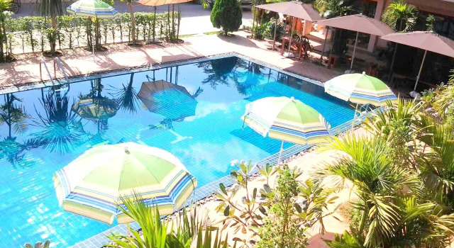 Кровать в общем номере Siam Tara Resort Chiangkhong