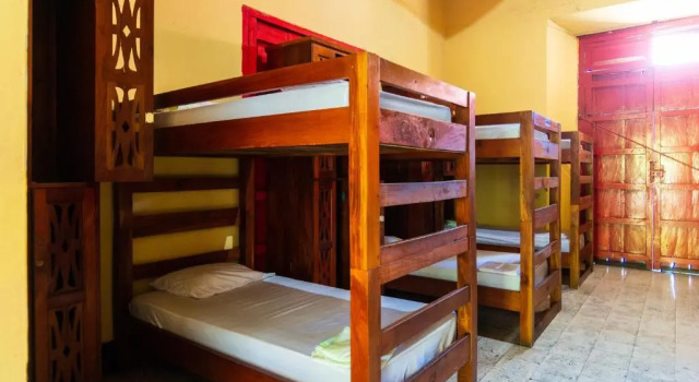 Кровать в общем номере Hostal Lazybones