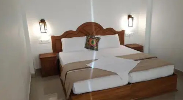 Holiday Villa, Забронировать Вилла Недорогие отели штата Кералы, недорого