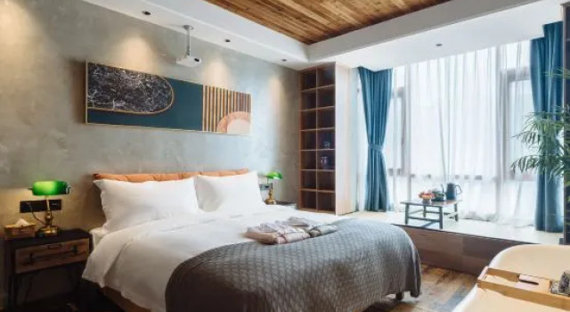 Люкс с 2 комнатами Wuxiang Duoyun Hostel