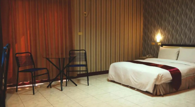 Номер Deluxe Jiuning Business Hotel