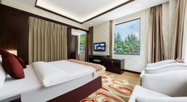 Люкс Jiuzhaigou Ge'erdan Hotel