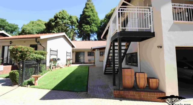 Апартаменты Acacia Grove Guest House