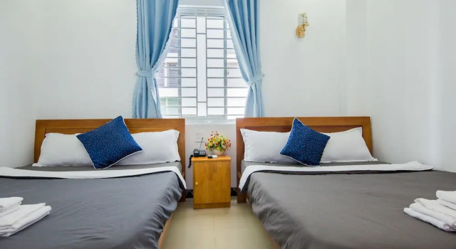 Четырёхместный семейный номер Standard Hoang Anh Hotel