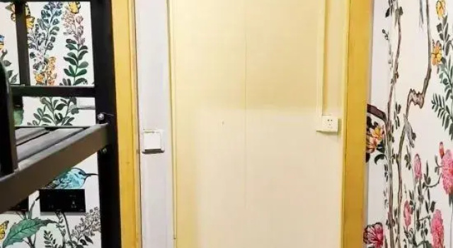 Кровать в общем номере (мужской номер) Jingu Garden Hotel (Wenchang Railway Station Wennan Old Street)
