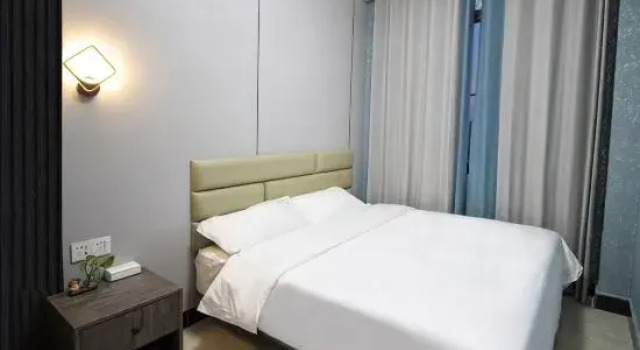 Люкс Nanning New Sunshine Apartment (Nanning Guangxi University Xinxiu Park Subway Station)