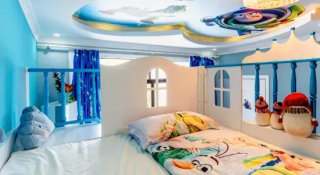 Кровать в общем номере Dini Kingdom Theme Homestay
