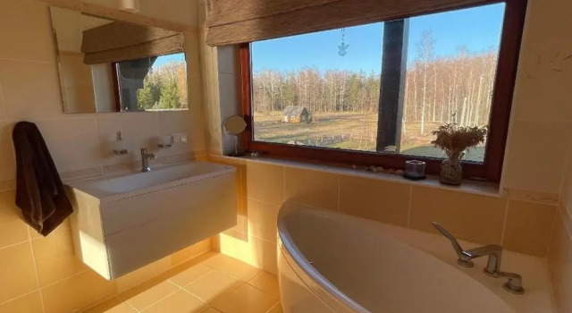 Sunset Beach House, Buchen Sie Ferienhaus Villen in Livland, Villa