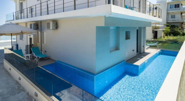 Апартаменты с 3 комнатами Sonja Beachfront Apartments