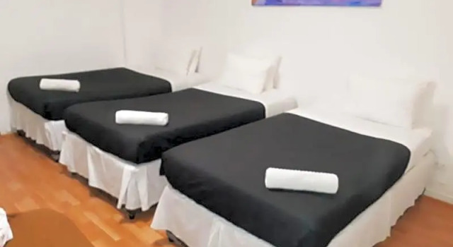 Кровать в общем номере Casona Recoleta