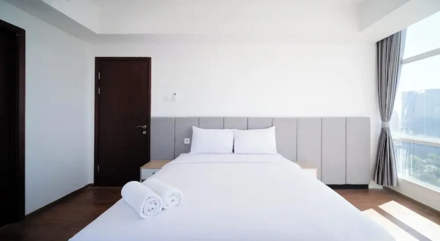 Апартаменты Exclusive and Spacey 3BR at Grand Sungkono Lagoon Apartment By Travelio
